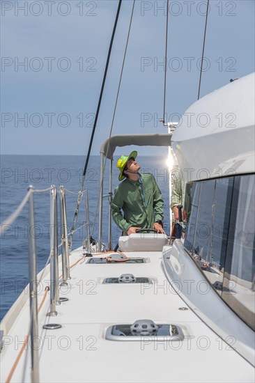 Skipper at the wheel