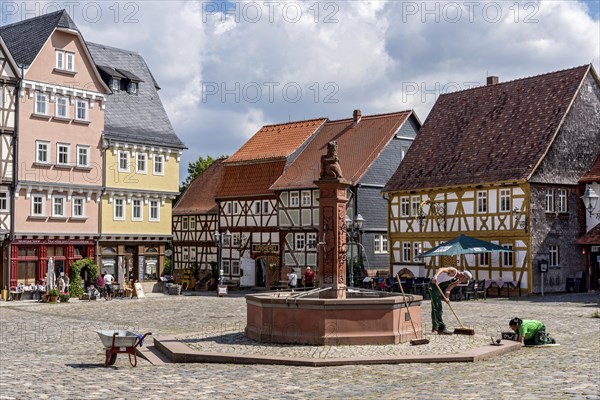 Craftsmen working at the market fountain