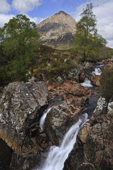 Waterfall and Buachaille Etive Mor at Glen Etive in Glencoe