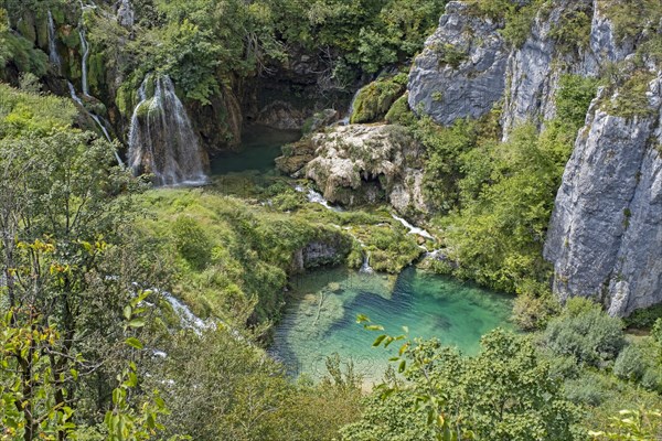 Waterfalls and green tufa lakes in the Plitvice Lakes National Park