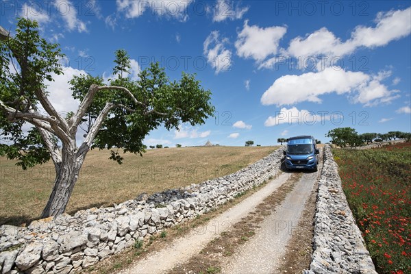 Camper van on a side road between Noci and Alberobello