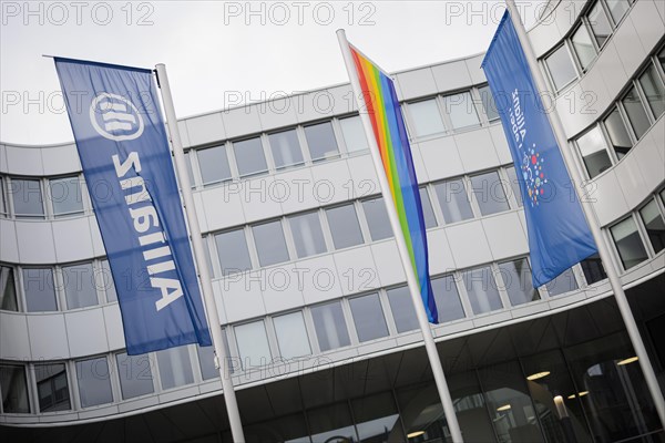 Flags of Allianz stand in front of their location in Berlin. 04.02.2022.
