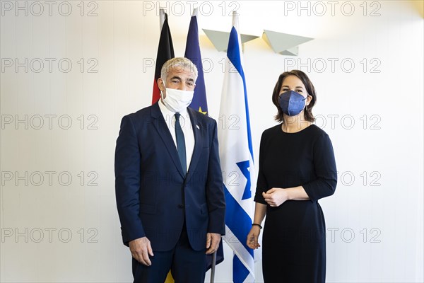 (R-L) Annalena Baerbock (Buendnis 90 Die Gruenen), Federal Minister of Foreign Affairs, photographed during a joint meeting with Jair Lapid, Foreign Minister and alternate Prime Minister of Israel, in Tel Aviv, 10.02.2022. Baerbock is visiting Israel, the Palestinian Territories, Jordan and Egypt as part of the trip, Tel Aviv, Israel, Asia