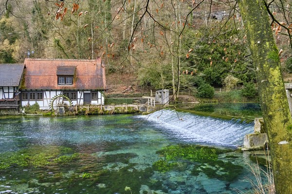 The Blautopf with historic hammer mill in Blaubeuren on the eastern edge of the Swabian Alb near Ulm