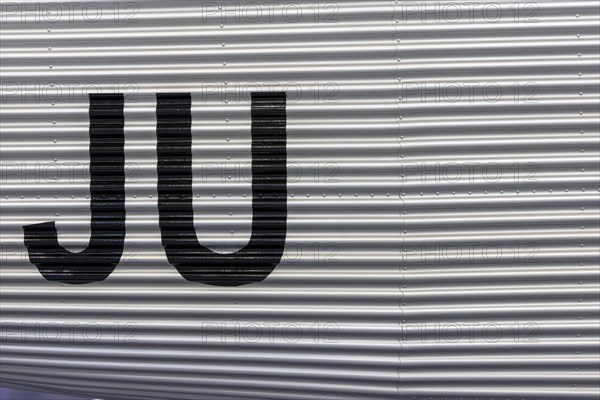 Detail of a Junkers aluminium aircraft with large letters JU