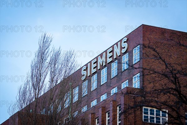 A lettering of the Siemens company on a branch in the Siemensstadt in Berlin