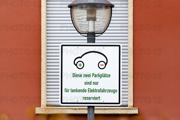 A parking sign for electric cars