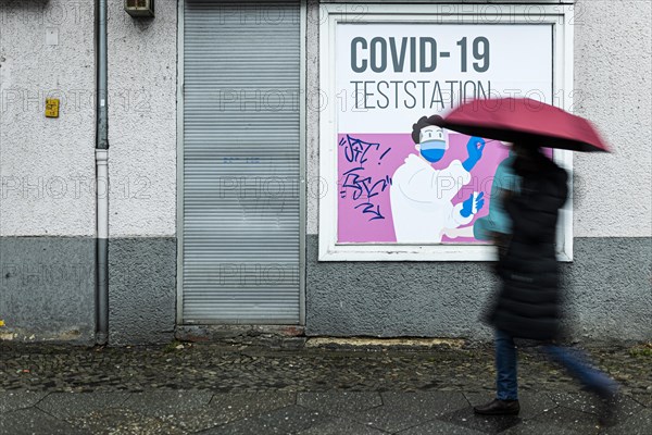 A person signs off at a closed test centre for Corona in Berlin