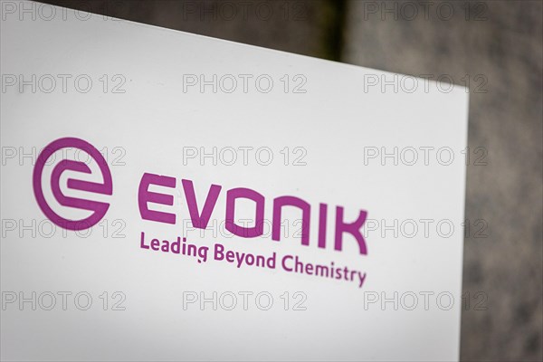 A sign of the evonik company at their headquarters in Essen