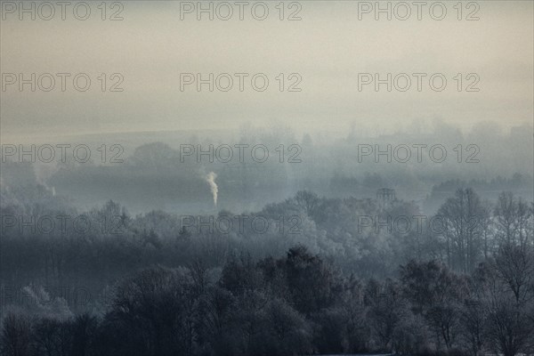 Smoke is visible from the chimneys on an icy morning in Koenigshain