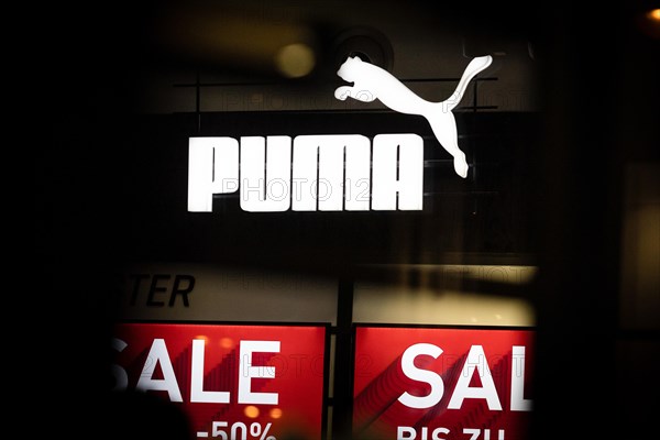 The logo of the sporting goods manufacturer PUMA in a branch in Berlin