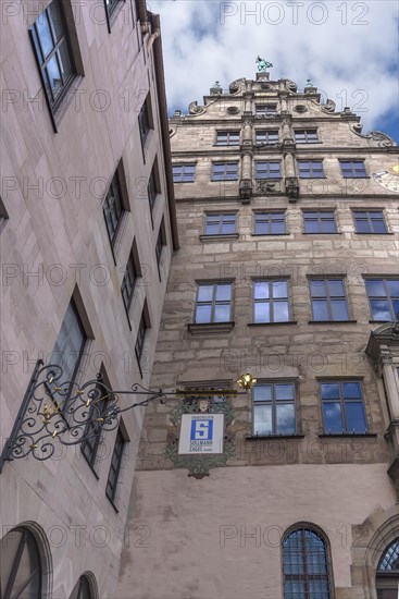 Historical nose sign on a residential and commercial building