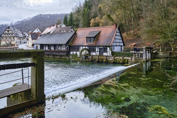 The Blautopf with historic hammer mill in Blaubeuren on the eastern edge of the Swabian Alb near Ulm