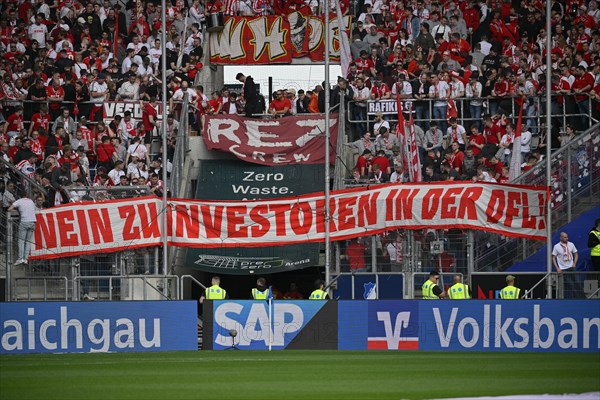 Banner in the fan block 1. FC Koeln NO TO INVESTORS IN THE DFL against patron Diemar Hopp