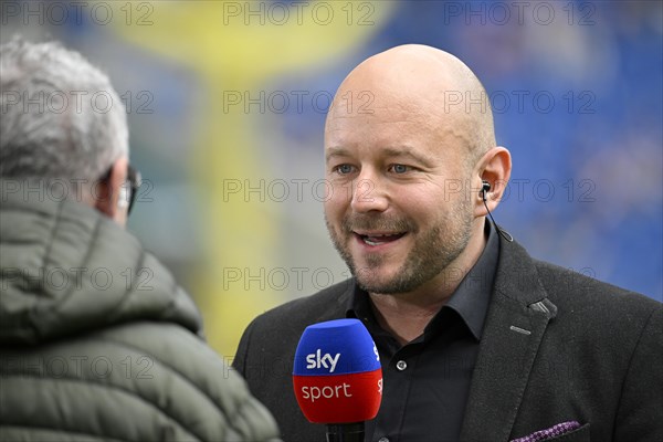 Director of Professional Football Alexander Rosen TSG 1899 Hoffenheim in interview Microphone Logo SKY