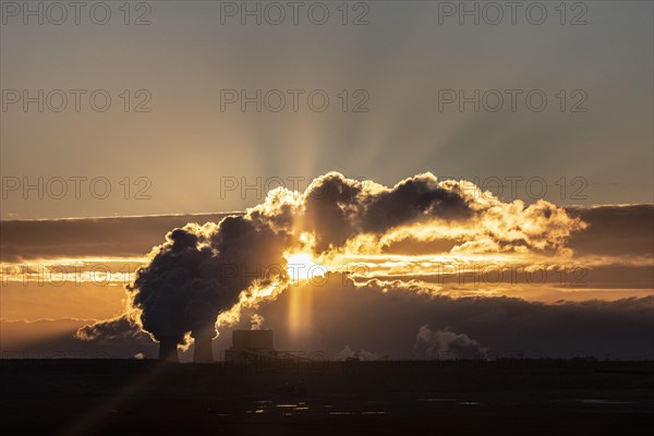 The Schwarze Pumpe coal-fired power plant stands out against the rising sun