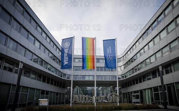 Flags of Allianz stand in front of their location in Berlin. 04.02.2022.