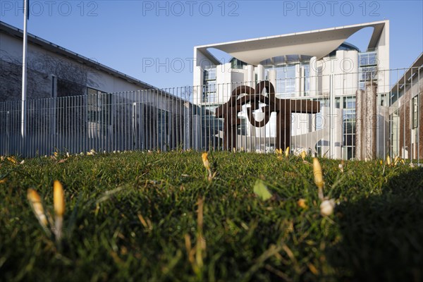 Crocuses bloom in front of the Federal Chancellery in Berlin. 16.03.2022.
