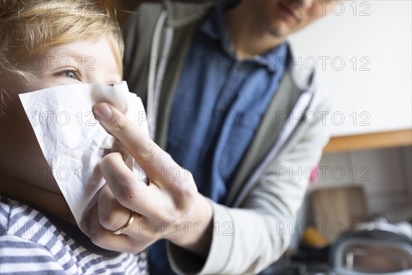 Subject: Toddler gets his nose wiped