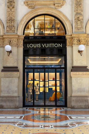 Shop window of the luxury shop LOUIS VUITTON at Galleria Vittorio Emanuele II