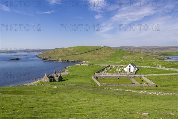 Ruin of old fishing booth and 18th century Lunna Kirk at East Lunna Voe