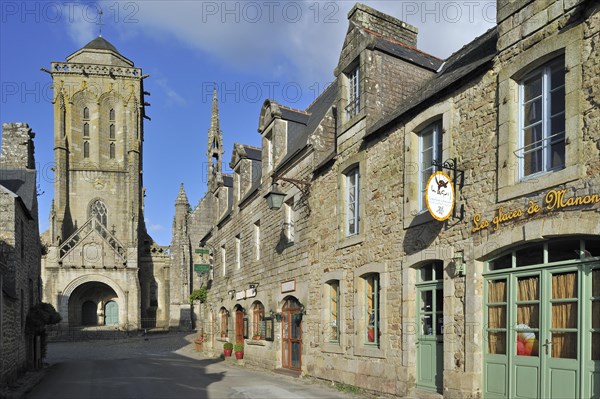 Old picturesque houses and the Saint Ronan church at Locronan