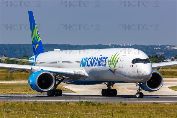 An Air Caraibes Airbus A350-1000 aircraft with registration F-HTOO at Paris Orly Airport