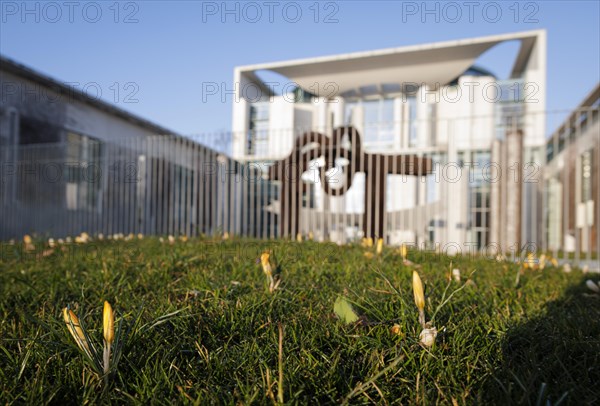 Crocuses bloom in front of the Federal Chancellery in Berlin. 16.03.2022.