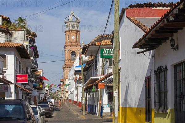 Street and Church of Our Lady of Guadalupe in the city Puerto Vallarta