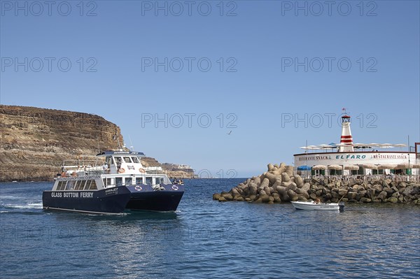 Harbour. Lighthouse. Excursion boat