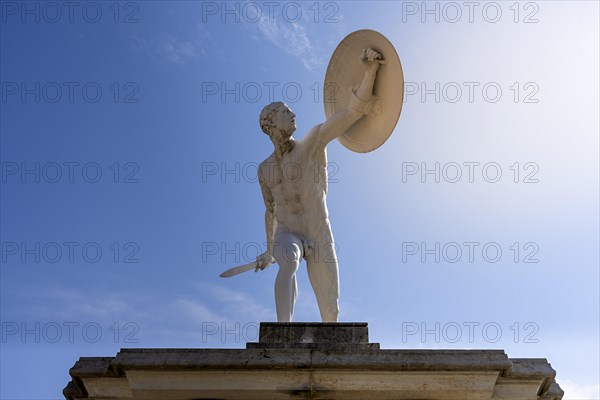 Statue of naked warriors in front of the main entrance to Charlottenburg Palace