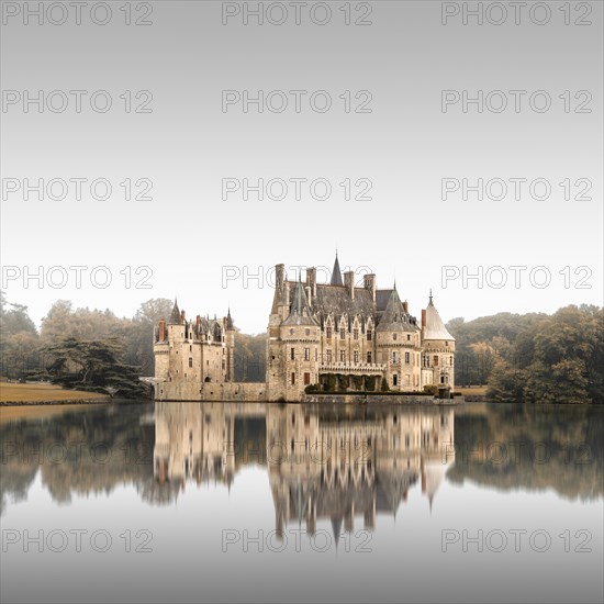 Long exposure with reflection in the lake of Chateau de la Bretesche near Nantes