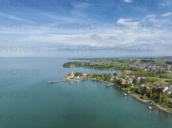 Aerial view of the moated castle peninsula on Lake Constance with the baroque church of St. George