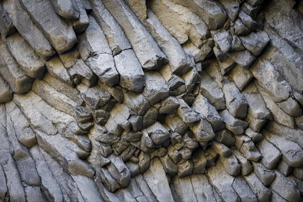 Rock formations of basalt and lava rock in the river park Gole dell' Alcantara