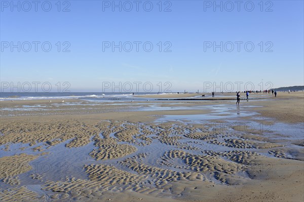 Beach at low tide with wave-like pattern