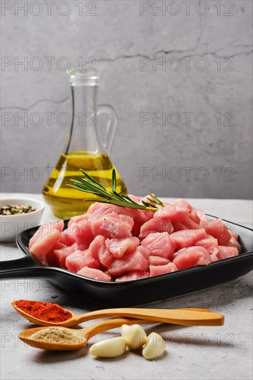 Closeup view of raw pork goulash with spice