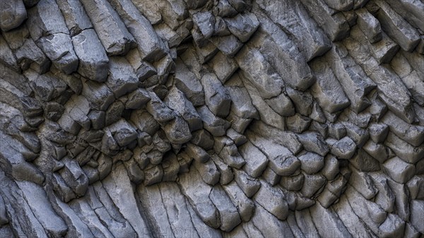 Rock formations of basalt and lava rock in the river park Gole dell' Alcantara