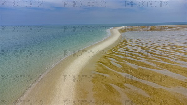 Aerial of a long sand strip