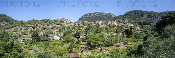 View of Valldemossa mountain village with typical stone houses