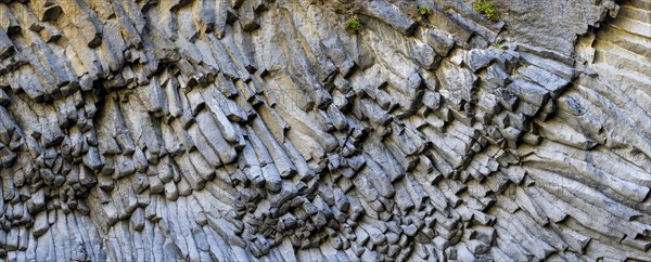 Rock formations of basalt and lava rock in the river park Gole dell' Alcantara