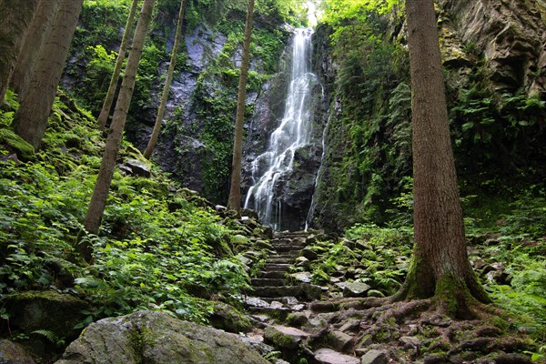 Landscape shot of the Burgbach waterfall