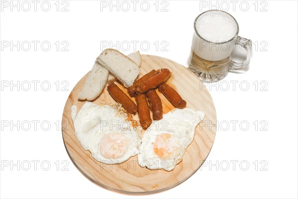 Typical spanish meal of fried eggs with sausage