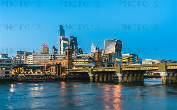 Cannon Street Railway Bridge ane Skyscrapers over River Thames