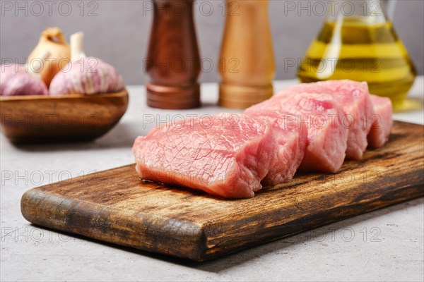 Closeup view of uncooked fresh pork chops