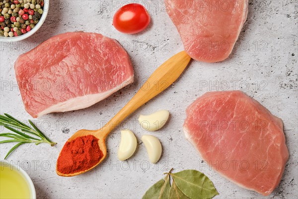 Top view of food ingredients scattered on grey background