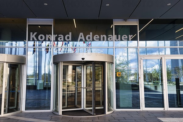 Entrance with revolving door and lettering