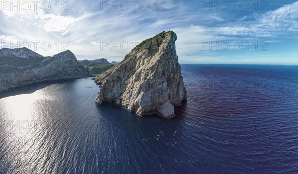 Flight past rocky cliffs and sea