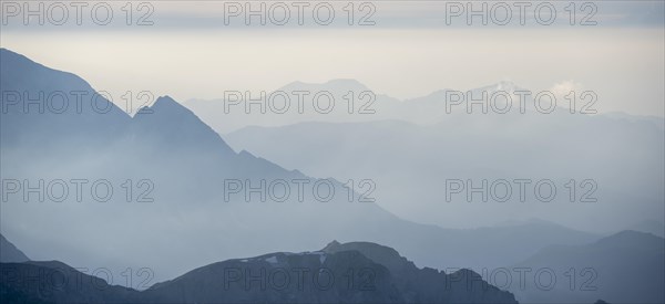 Silhouettes of mountains at sunset