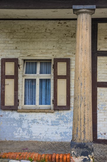 Window and column on the heritage-protected half-timbered building of the Neustaedter Wache