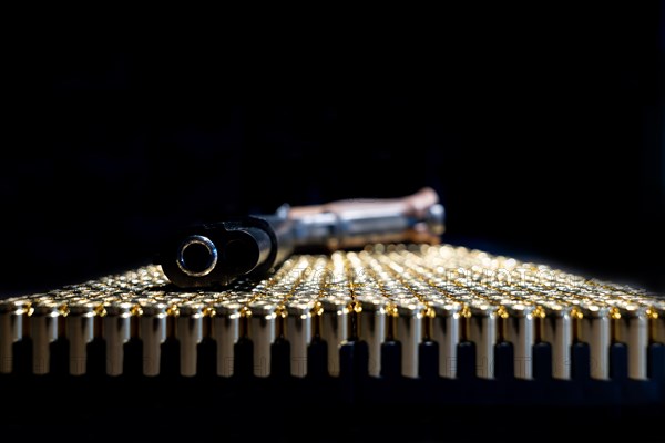 Elegant Semiautomatic 9mm Handgun Leaning on Bullet Ammunition in Switzerland